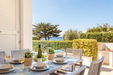 the terrace of this villa in Binisafuller, ideal for moments of tranquillity during your trip.