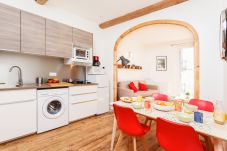 Fitted kitchen with a diner table