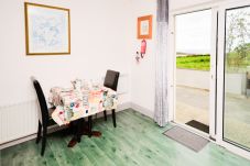 Dining Room of Sky Road Holiday Home located on the scenic Sky Road is a large coastal proeprty sleeping 10, close to the vibrant town of Clifden