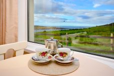 Details of Sky Road Holiday Home located on the scenic Sky Road is a large coastal proeprty sleeping 10, close to the vibrant town of Clifden