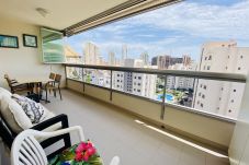 Large furnished outdoor terrace with fold-out glass