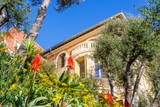 Villa with terraces and garden