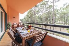 Balcony overlooking nature where you can enjoy breakfeast with the family.