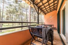 Balcony with table for meals.