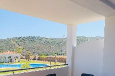 Apartment in Manilva - Beachfront Condo With Pool and Lush Green Views