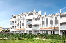 Apartment in Manilva - Beachfront Condo With Pool and Lush Green Views