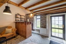 Seating area and Kitchenette Ventry Farm Shamrock Cottage 