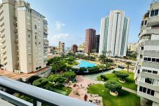 Vistas a la naturaleza y piscina de un apartamento vacacional