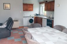 Cosy open plan Kitchen with dining area at Seamount Holiday Village No 26. Sea side holiday home in Co Wexford.